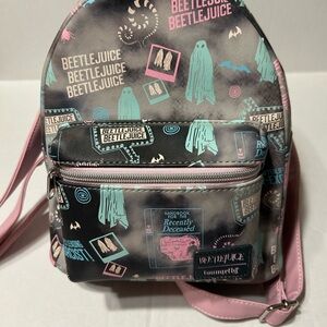 Loungefly Beetlejuice Mini Backpack – Pastel Horror Print | Gently Used‎